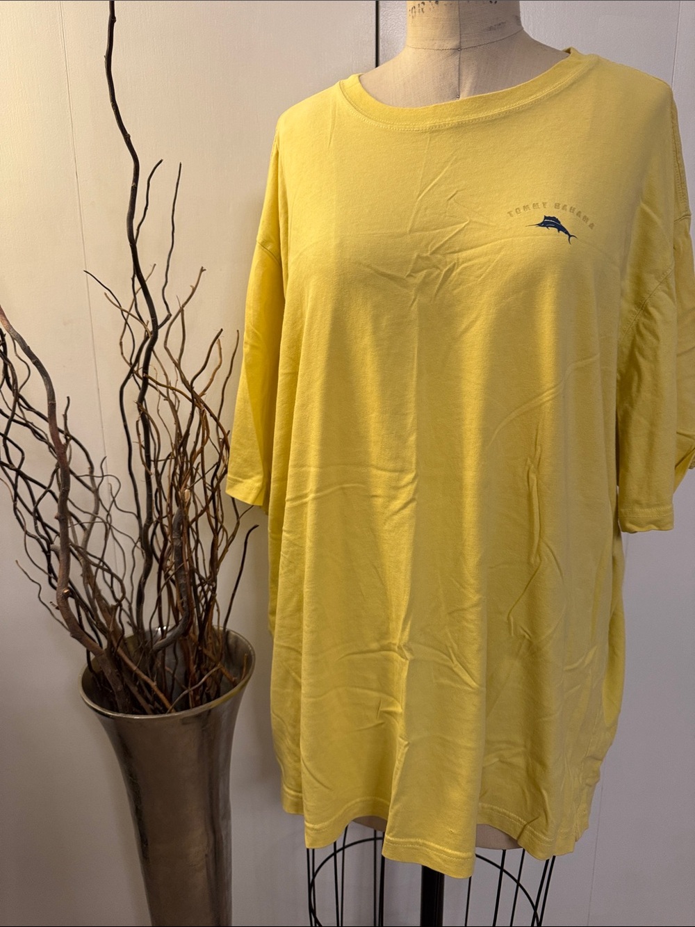Tommy Bahama yellow tee with "Golf Tips" design